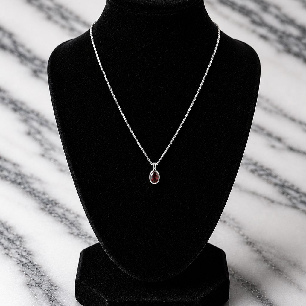 Red garnet necklace on white gold